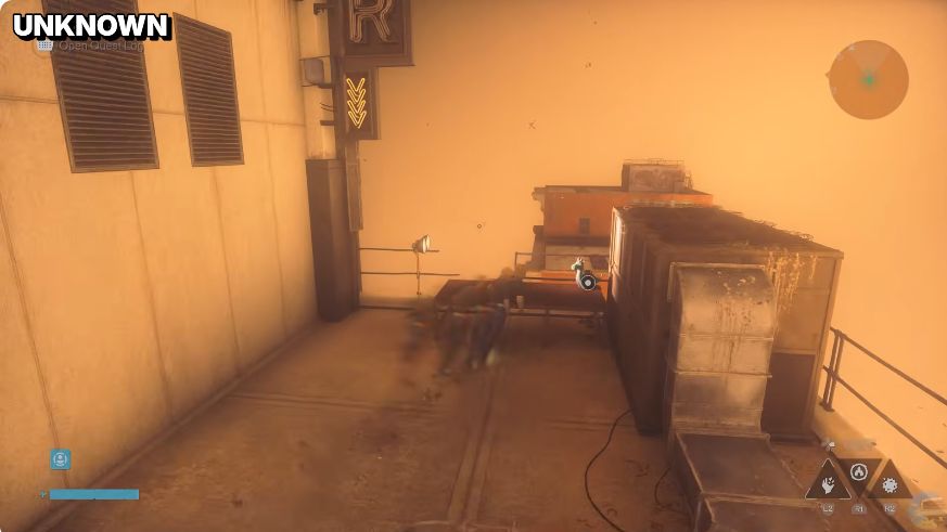 Unknown balcony beneath a downward BAR arrow, with the toy on the surface ahead beside rooftop equipment