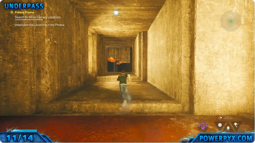 Dylan inside the yellow-lit Underpass corridor after using the underside route
