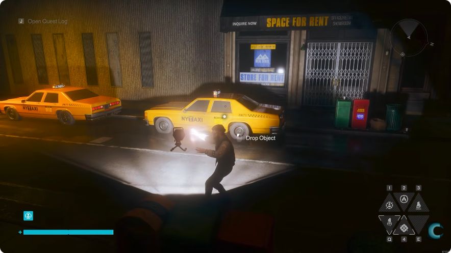 Dylan holding the portable lamp with a taxi silhouette and roof-sign shape on the wall behind the car