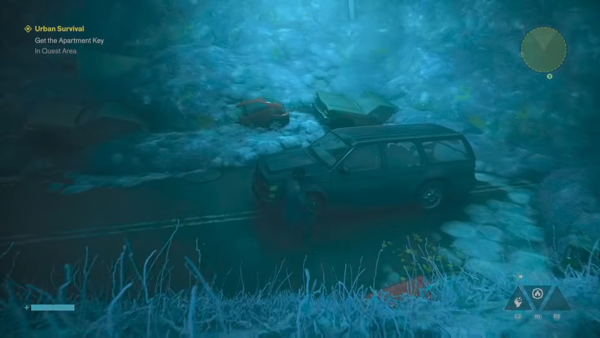 The car at the bottom of the blue subway-entrance pit